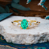 Sophisticated 4-Prong Oval Cut Emerald Engagement Ring