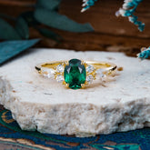 Sophisticated 4-Prong Oval Cut Emerald Engagement Ring
