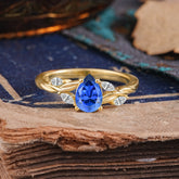 Exquisite 4-Prong Pear Cut Sapphire Engagement Ring