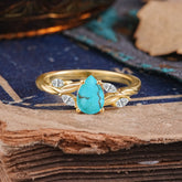 Exquisite 4-Prong Pear Cut Turquoise Engagement Ring