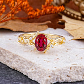 Nature-Inspired Branch-Wrapped 4-Prong Oval Ruby Engagement Rings