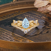 Nature-Inspired Pear-Cut Aquamarine Couple's Engagement Ring Set