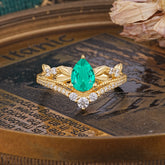 Nature-Inspired Pear-Cut Emerald Couple's Engagement Ring Set