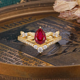 Nature-Inspired Pear-Cut Ruby Couple's Engagement Ring Set