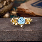 Nature-Inspired 4-Prong Round Aquamarine Engagement Ring