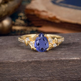 Nature-Inspired Classic Luxe 4-Prong Pear-Cut Tanzanite Engagement Ring