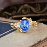 Contemporary Nature-Inspired 4-Prong Oval-Cut  Sapphire Engagement Ring