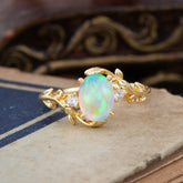 Contemporary Nature-Inspired 4-Prong Oval-Cut Natural Opal Engagement Ring