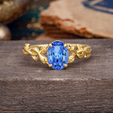 Nature-inspired Botanical Vine Entwined 4-Prong Oval-Cut Sapphire Engagement Ring