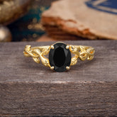 Nature-inspired Botanical Vine Entwined 4-Prong Oval-Cut Black Onyx Engagement Ring