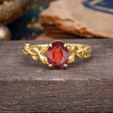 Nature-inspired Botanical Vine Entwined 4-Prong Oval-Cut Garnet Engagement Ring