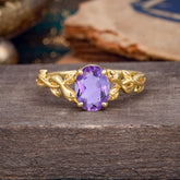 Nature-inspired Botanical Vine Entwined 4-Prong Oval-Cut Amethyst Engagement Ring