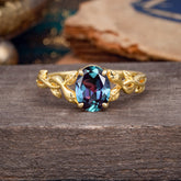 Nature-inspired Botanical Vine Entwined 4-Prong Oval-Cut Alexandrite Engagement Ring