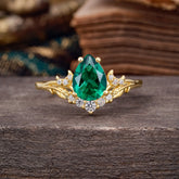Nature and Moon-Inspired 4-Prong Pear-Cut Emerald Engagement Ring