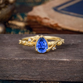 Nature-Inspired 3-Prong Pear-Cut Sapphire Engagement Ring