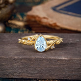 Nature-Inspired 3-Prong Pear-Cut Aquamarine Engagement Ring