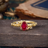 Nature-Inspired 3-Prong Pear-Cut Ruby Engagement Ring