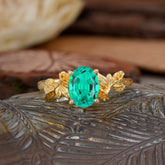 Nature-Inspired 4-Prong Oval-Cut Emerald Engagement Ring