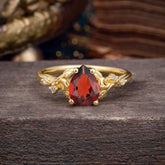 Vintage Minimalist 4-Prong Pear-Cut Garnet Engagement Ring