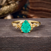 Vintage Minimalist 4-Prong Pear-Cut Emerald Engagement Ring