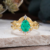 Nature-Inspired 3-Prong Tear-Cut Emerald Engagement Ring Set