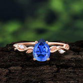 Nature-Inspired Classic 4-Prong Pear-Cut Sapphire Engagement Ring