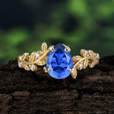 Nature-Inspired Vine-Entwined 4-Prong Teardrop-Cut Sapphire Engagement Ring