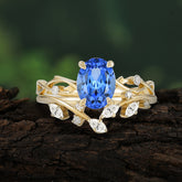 Nature-Inspired Oval Cut 4 Prong Sapphire Engagement Ring Set