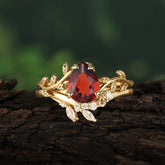 Nature  Inspired 4  Prong Pear  Cut Garnet Wedding Ring Sets