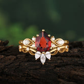 6 Prong Romantic Vine Themed Pear Cut Garnet Rings