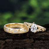 Nature-Inspired Branch-Wrapped 4-Prong Oval Moissanite Engagement Couple Rings
