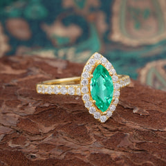 Classic Marquise Cut Emerald Halo Engagement Ring