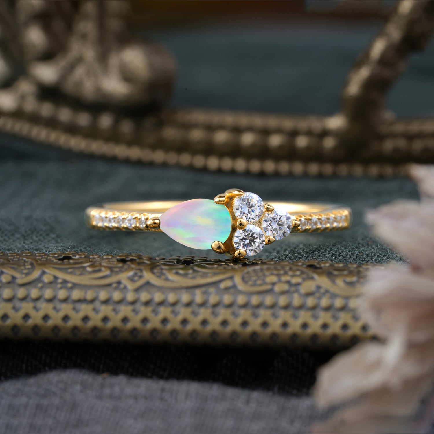 3 Prong Pear Shaped Opal Three Round Stone Engagement Ring