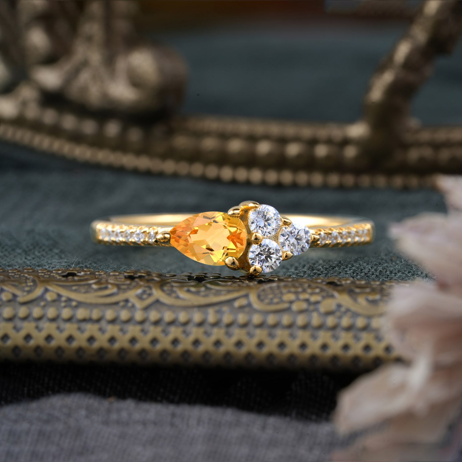 Pear Shaped Citrine Three Round Stone Engagement Ring