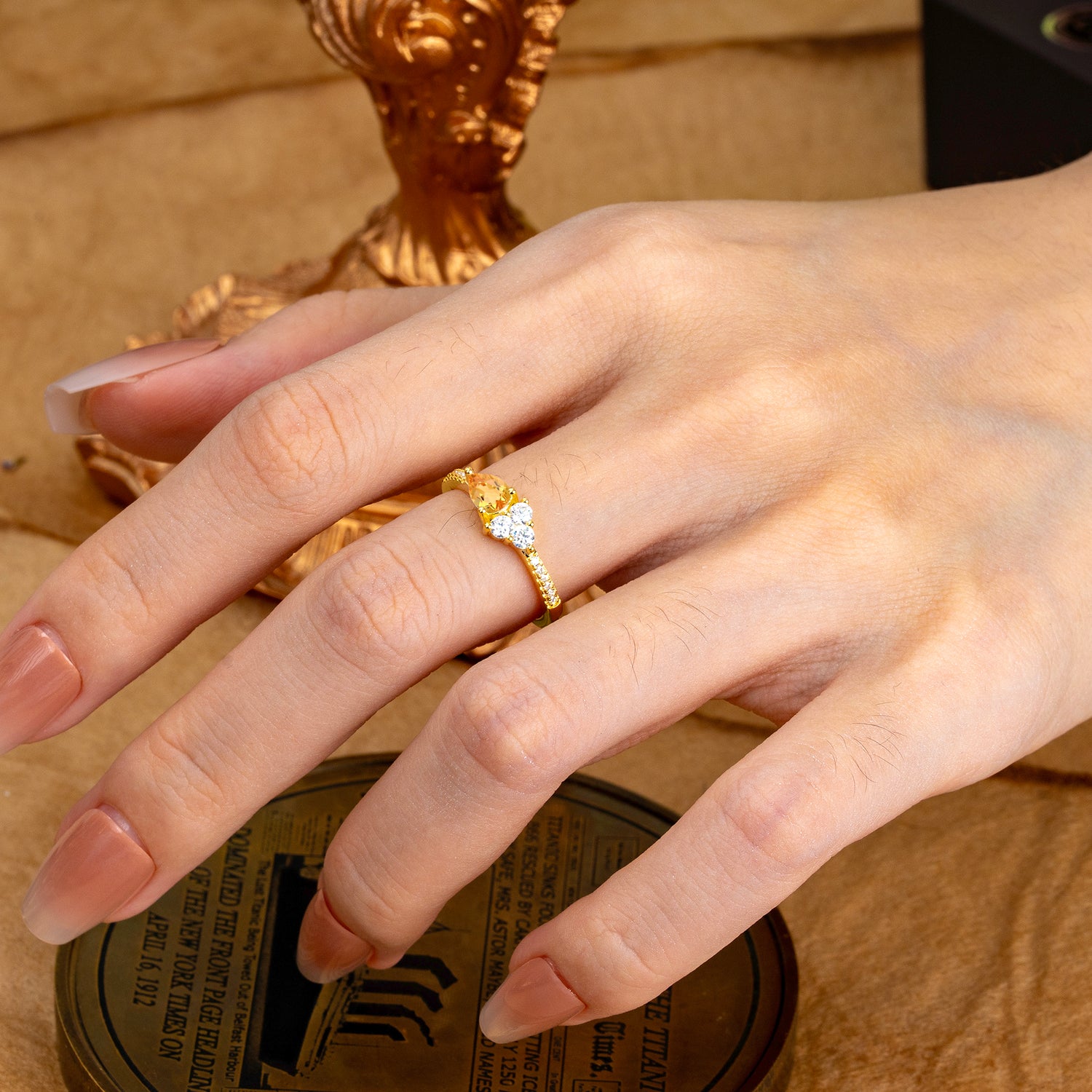 Pear Shaped Citrine Three Round Stone Engagement Ring