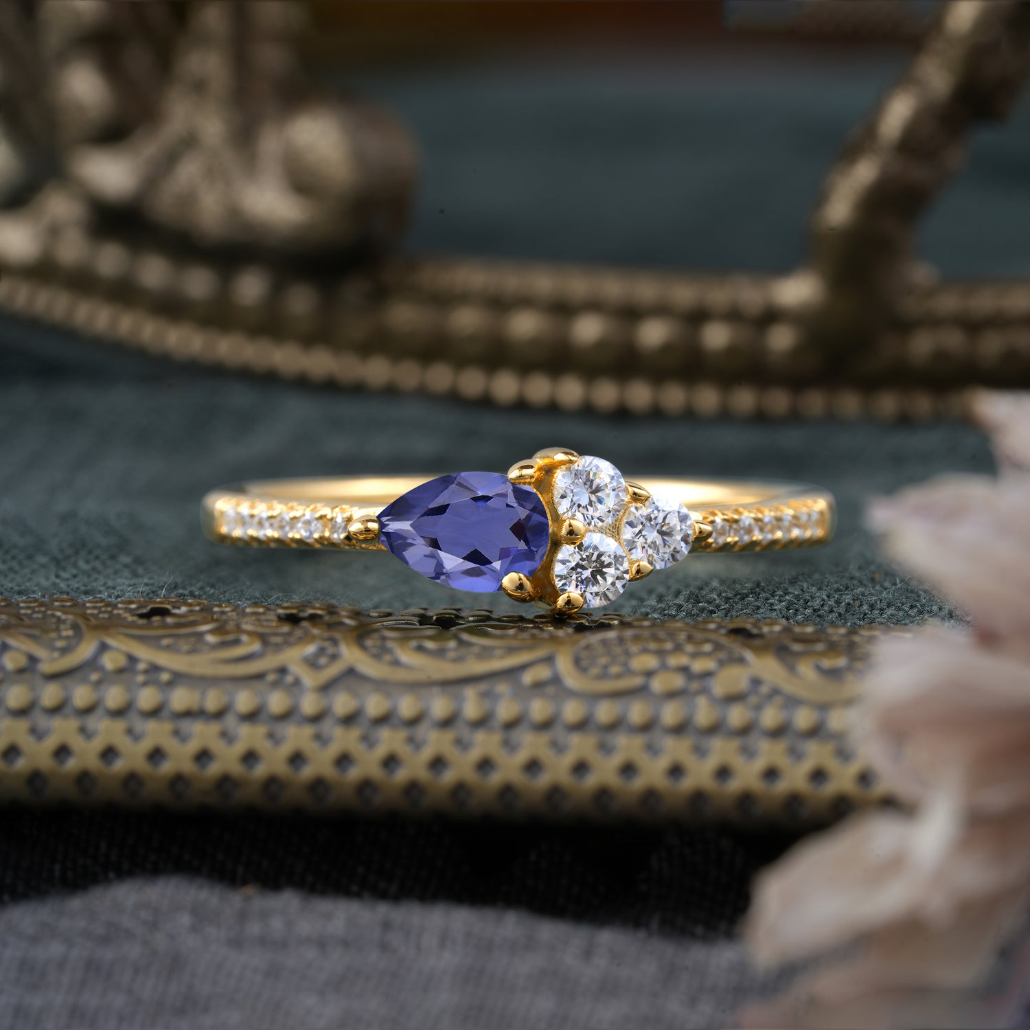 3 Prong Pear Shaped Tanzanite Three Round Stone Engagement Ring