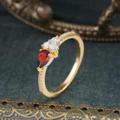 Pear Shaped Garnet Promise Wedding Band Ring with Three Round Stone