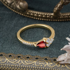 Pear Shaped Garnet Promise Wedding Band Ring with Three Round Stone