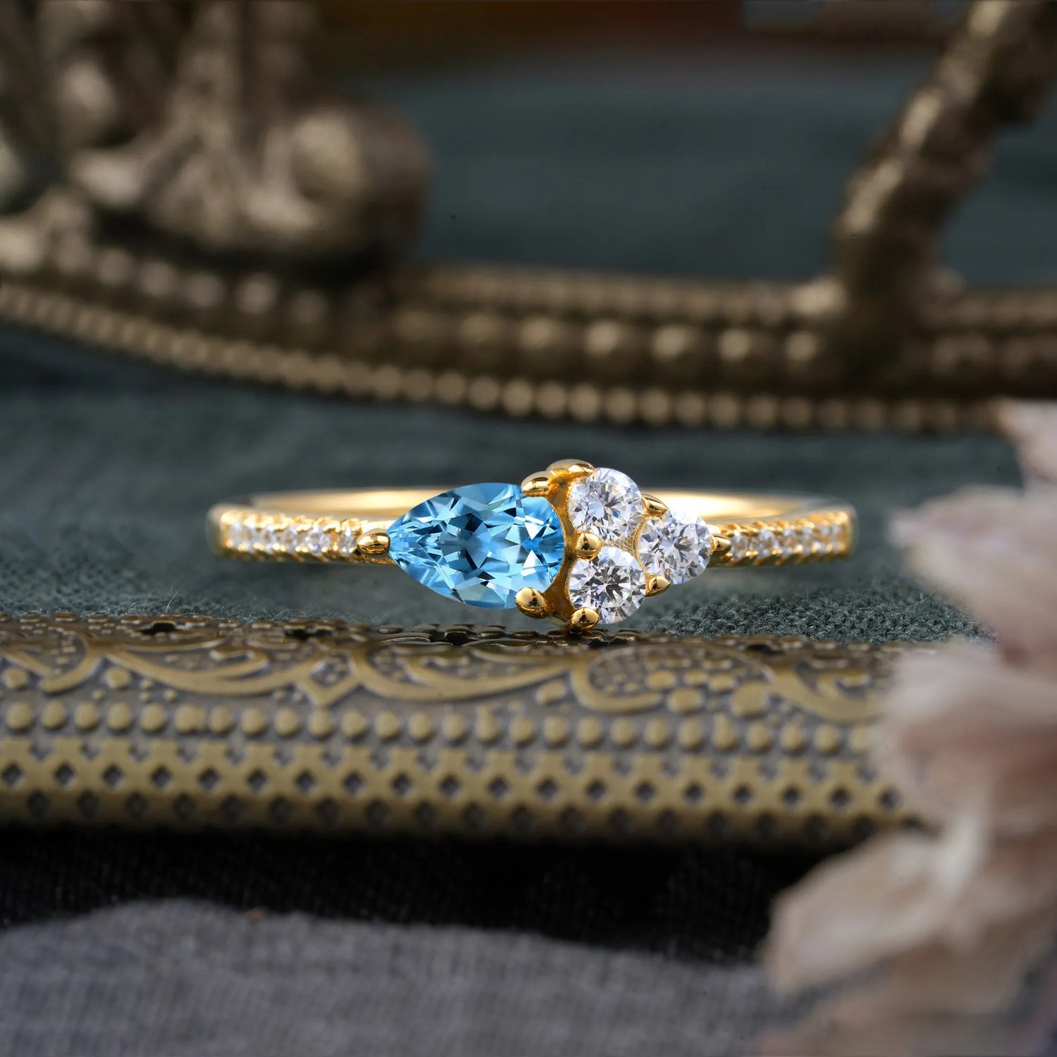 3 Prong Pear Shaped Aquamarine Three Round Stone Engagement Ring