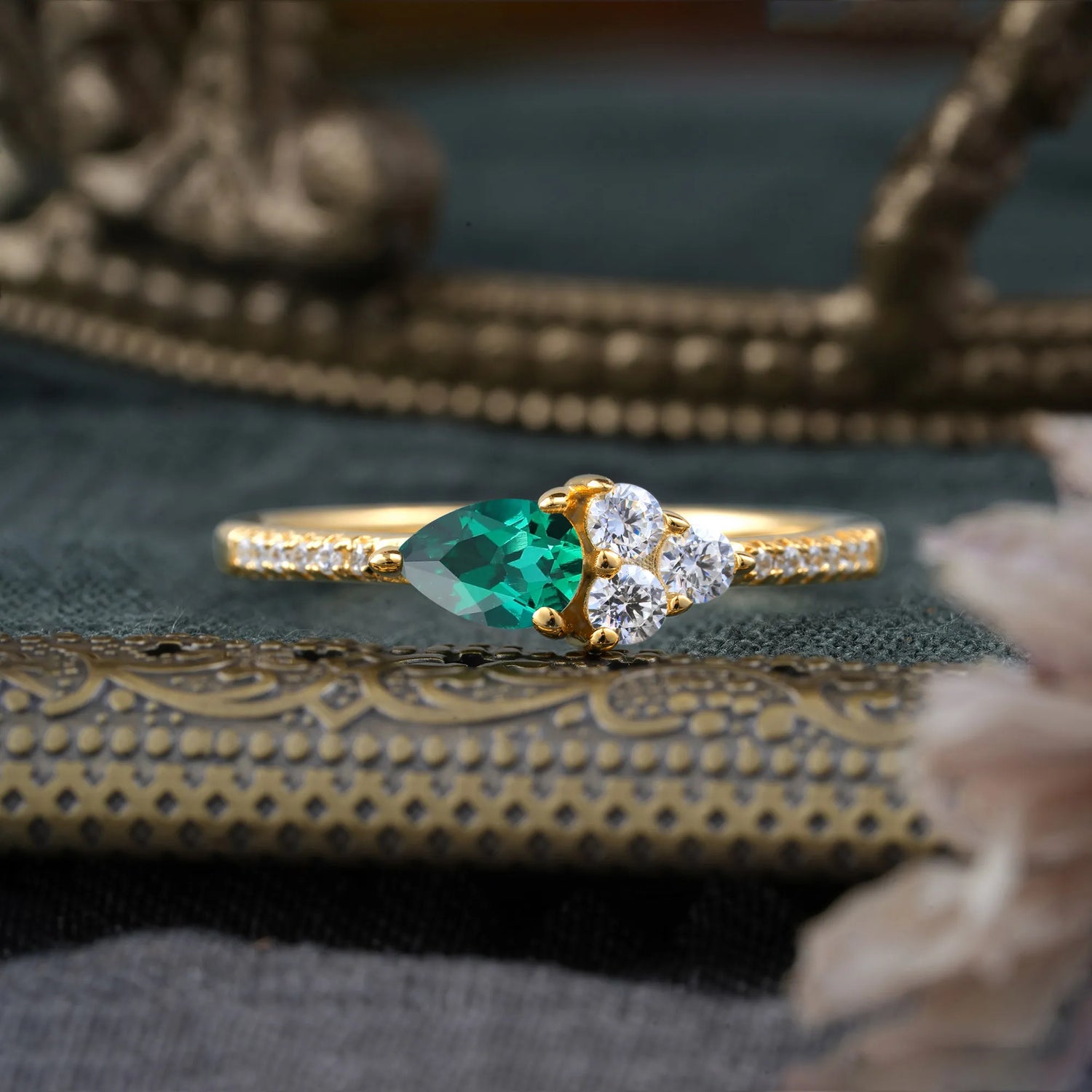 3 Prong Pear Shaped Emerald Three Round Stone Engagement Ring