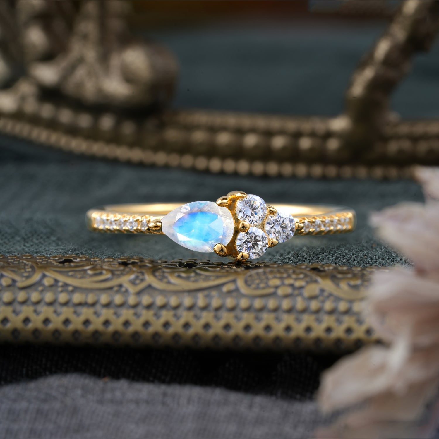 3 Prong Pear Shaped Moonstone Three Round Stone Engagement Ring