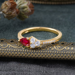 Pear Shaped Ruby Promise Wedding Band Ring with Three Round Stone