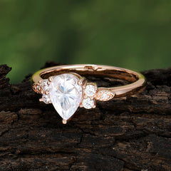 Pear Cut Classic Lab Grown Moissanite Engagement Ring with Side Stone