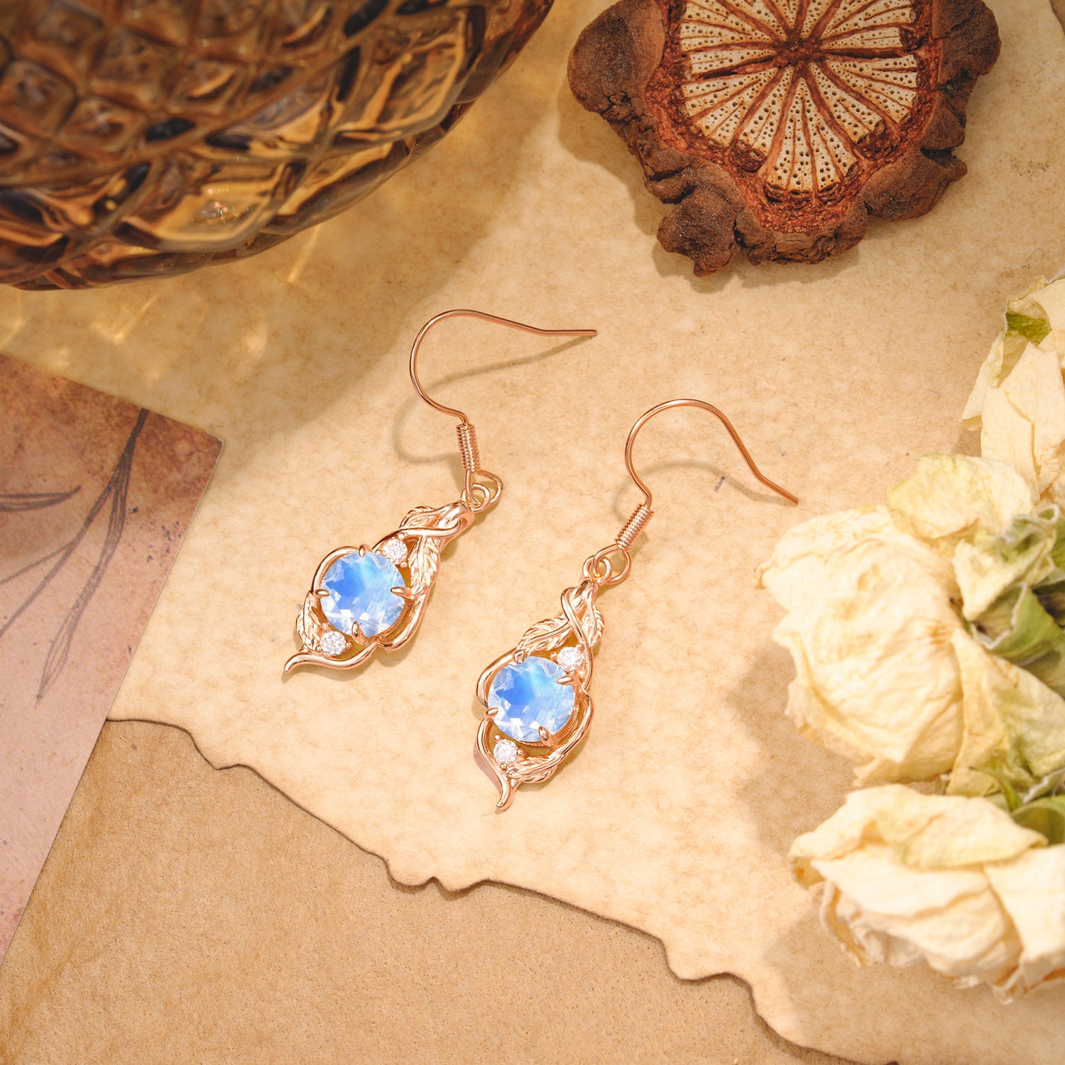 Luxury Round Cut Moonstone Earrings with Leaf Wrap Design - Romalar Jewelry