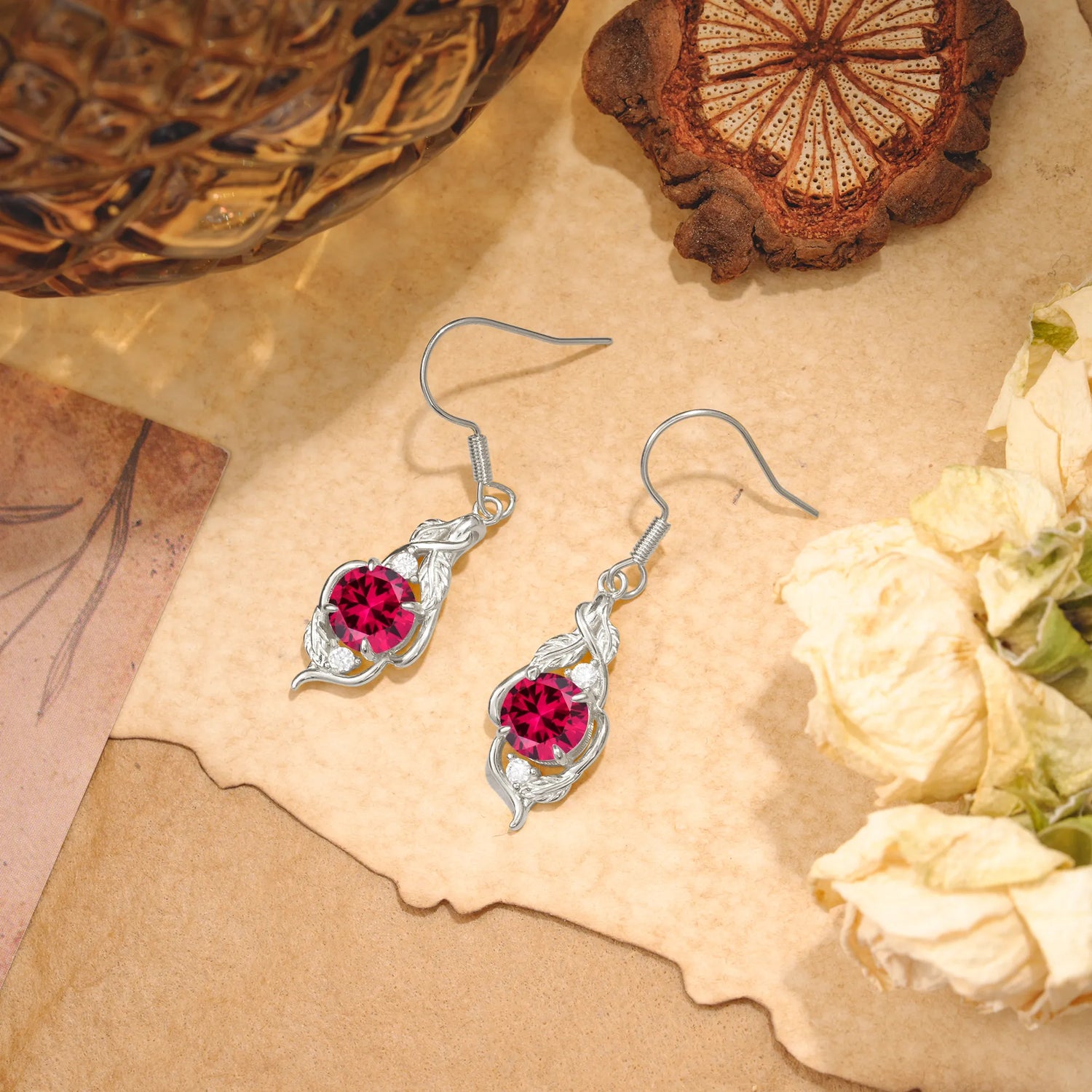 Luxury Round Cut Ruby Earrings with Leaf Wrap Design