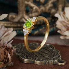 Heart Cut Classic Peridot Engagement Ring Side with 3-stone