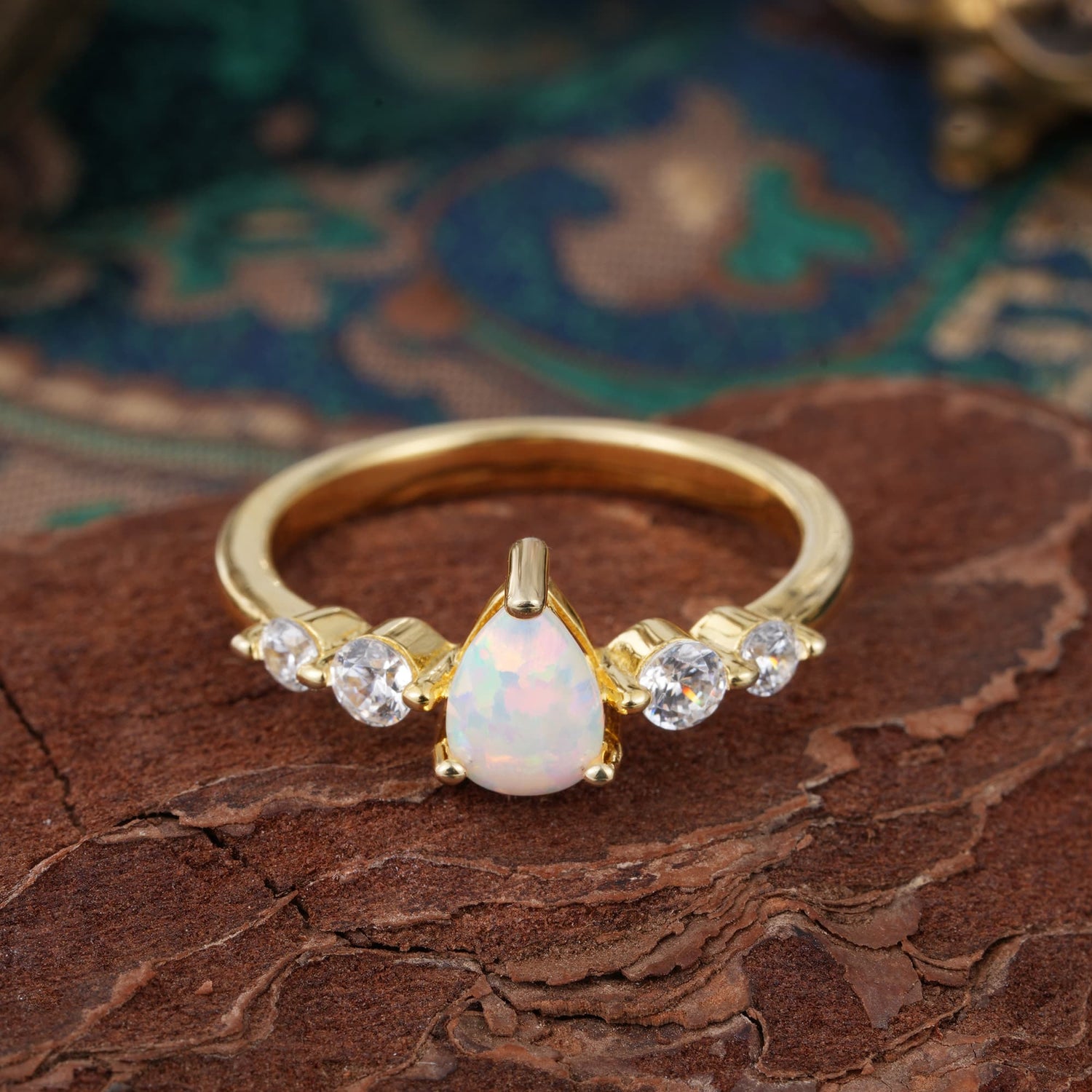 Pear Cut 3 Prong Classic Opal Side Stone Engagement Ring