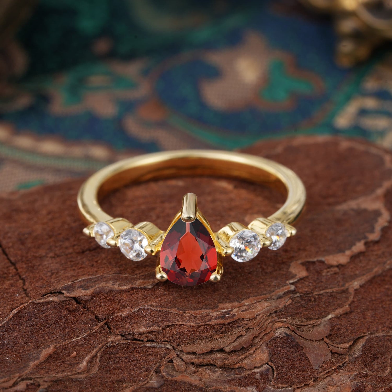 Pear Cut 3 Prong Classic Garnet Side Stone Engagement Ring