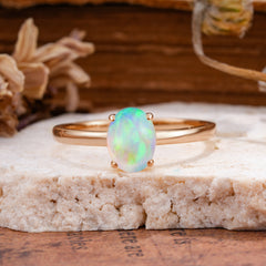 Minimalist Oval Cut 1.5 Carat Opal Solitaire Engagement Ring