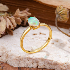 Minimalist Oval Cut 1.5 Carat Opal Solitaire Engagement Ring